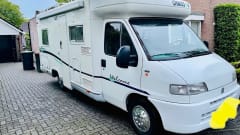 Attractive camper with fixed bed and easy to park