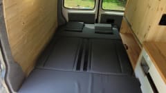 4-person Volkswagen with pop-up roof and long wheelbase for extra space