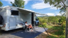 Comfortable camper with single beds and air conditioning