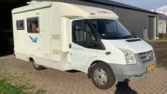 Semi-integrated camper