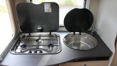 2/25 – Compact and luxurious 2-person camper with fixed bed in the back!