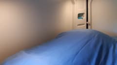 Nice Pössl camper van with comfortable bed