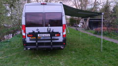 Tough 2022 Fiat Ducato with longitudinal beds, off-grid.