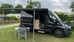 Super cool Hymer Ayers Rock bus camper for 2 people