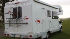 Spacious furnished family camper with bunk beds and air conditioning