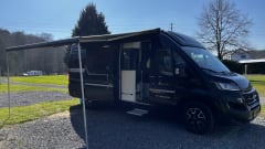 Fiat Adria 640 bus camper with large garage and fold-down bed 