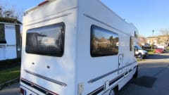 Zolu – Swift semi-integrale camper met 4 slaapplaatsen, gebouwd in 1998.