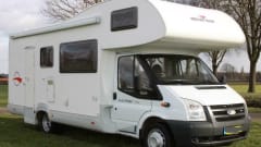 Spacious furnished family camper with bunk beds and air conditioning