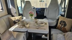Luxury 4-person motorhome with bicycle rack and tow bar, model 2026