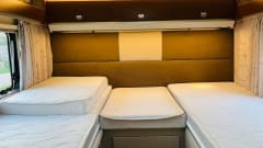 Koosje – Luxury Camper (5 persons) Lengthwise and lifting bed L-seat