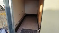  Beautiful compact Knaus camper with garage and large transverse bed!