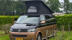 Exclusive camper van VW T5 with pop-up roof