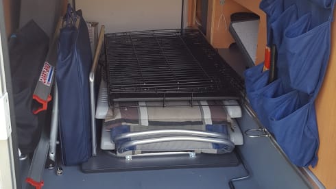 Comfortable camper with single beds and air conditioning