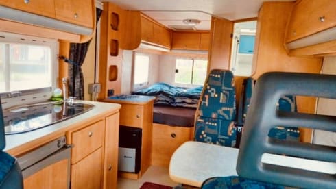 Attractive camper with fixed bed and easy to park