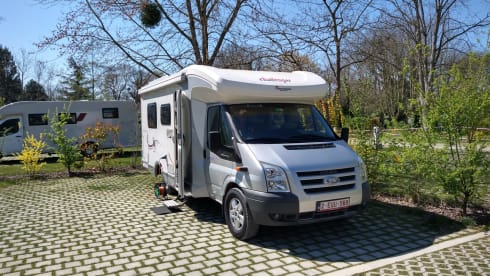 Comfortable motorhome with queen bed and electric bicycle carrier 
