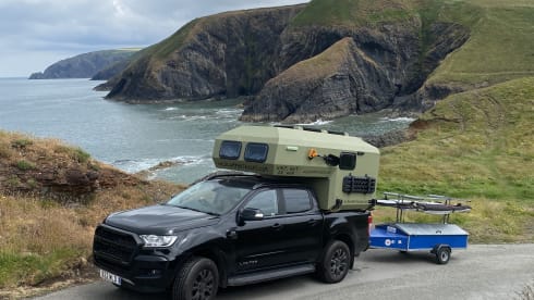 Edinburgh Airport - tardis camper on a pick up truck