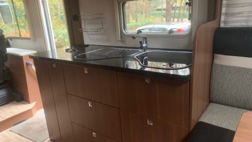 LMC Integral Camper with round seating layout