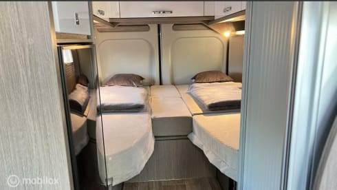 Luxury Pössl bus camper 640 with length beds