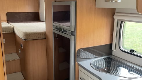 Semi-Integrated Camper for 4 people.