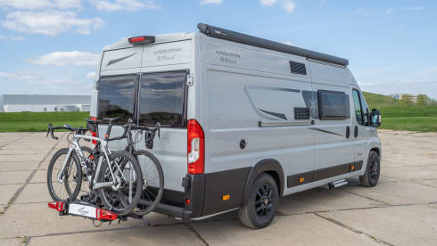 Off the Grid 1 – Brand new 6.36 bus camper with automatic transmission and solar panel, "off the grid no. 1"