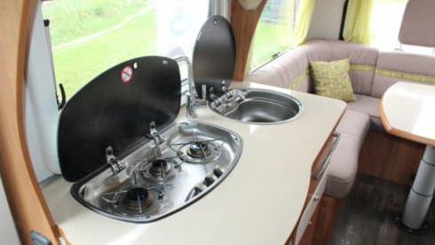 Adventurous and comfortable 2 person alcove camper