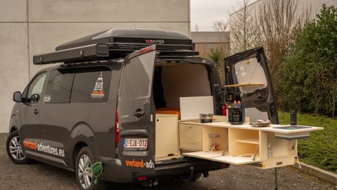The AdventuresVan β Off-grid custom-made campervan with roof tent