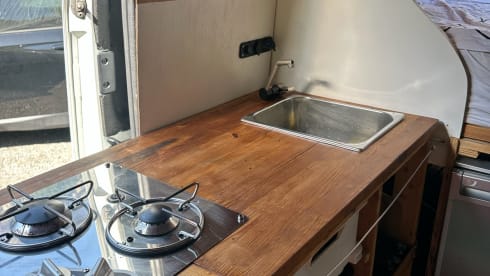 Atmospheric self-build camper van for 2 people (+ baby/small child)