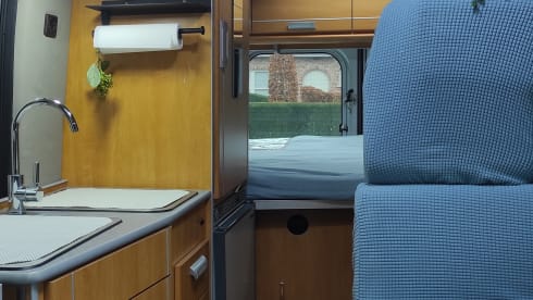 Cosy and compact 2p Ford Pösll campervan.