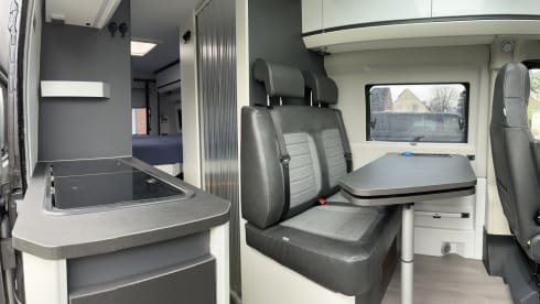 Fiat Adria 640 bus camper with large garage and fold-down bed 