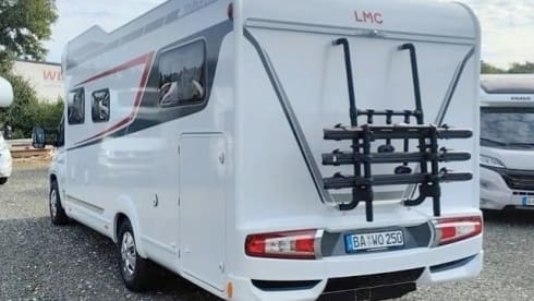 Wohnmobil LMC Tourer Lift, Hubbett, 4 Schlafplätze, Klimaanlage, SAT TV