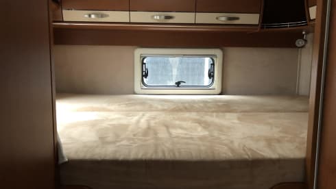 Wonderful luxury 4-person integral camper with plenty of storage space & bicycle carrier.
