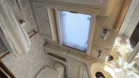 Zolu – Swift semi-integrale camper met 4 slaapplaatsen, gebouwd in 1998.