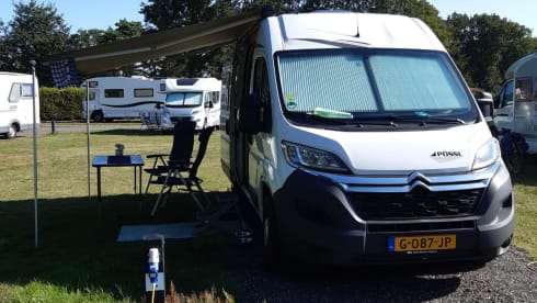 Nice Pössl camper van with comfortable bed