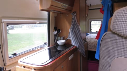 2 person bus camper with fixed bed and sanitary facilities