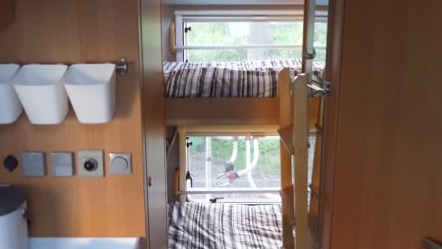 Compact family camper with bunk bed