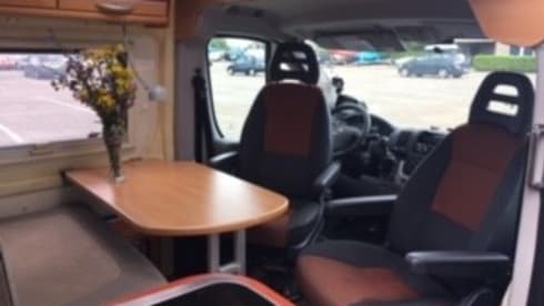 2 person bus camper with fixed bed and sanitary facilities