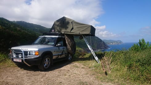 Disco II – Land Rover Discovery met rooftop tent uit 2002