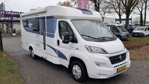 C12 – Hobby V65 Enkele Bedden Grote Garage