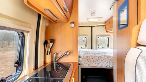 2 person bus camper with fixed bed and sanitary facilities