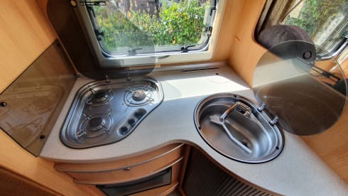 Comfortable camper with single beds and air conditioning