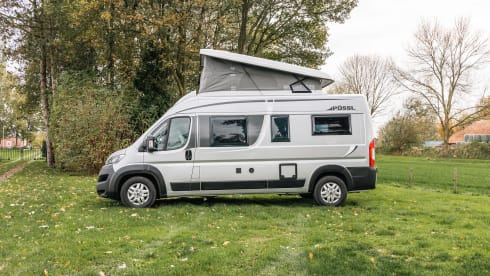 Fijnja – Luxury 4 pers. Pössl bus camper with sleeping lifting roof from 2019