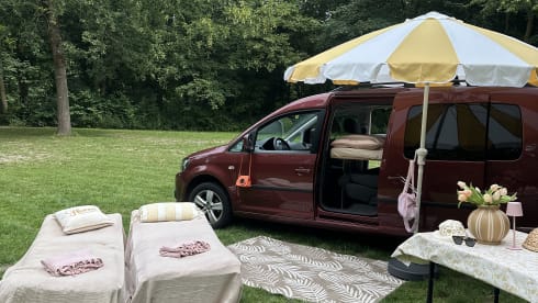 Super nice Volkswagen Caddy Maxi campervan from 2011 with tent, 4p