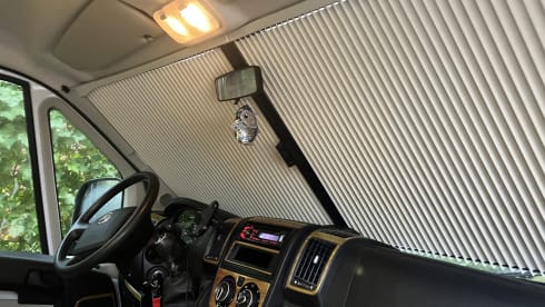 Modern family camper with 4 fixed beds and plenty of storage space