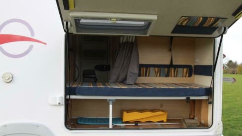 Spacious furnished family camper with bunk beds and air conditioning