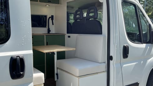 Trendy 2-person camper with solar panels