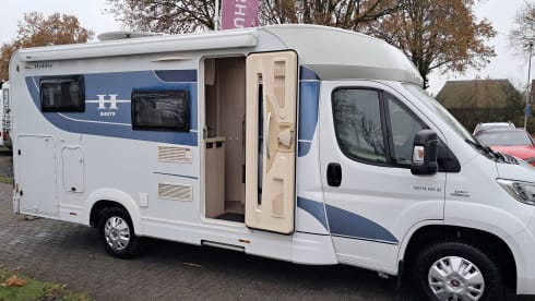 C12 – Hobby V65 Enkele Bedden Grote Garage