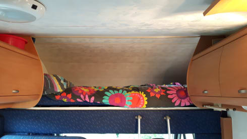 Spacious Fiat 2006 with a fixed bed, air conditioning and a very cozy interior.