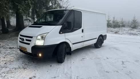 Stoere camperbus met een zacht interieur!