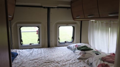 2 person bus camper with fixed bed and sanitary facilities