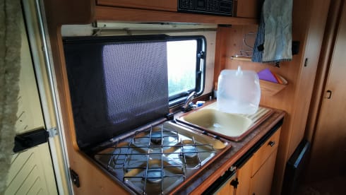 Get away with this 5 person camper!